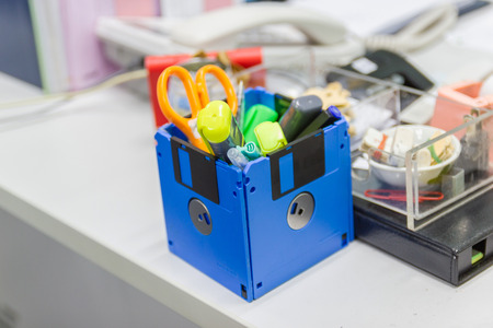 recycle floppy disk, Creative objects used for Store supplies such as pen pencils Scissors in a box...