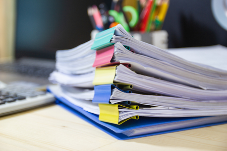 file folder and Stack of business report paper file on the table in a work office, concept document in work officeの写真素材