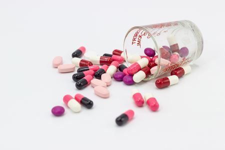 the pile of pills and capsules white background concept Healthの写真素材