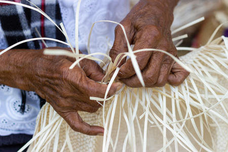 The villagers took bamboo stripes to weave into different forms for daily use utensils of the communityâs people in Bangkok Thailand, Thai handmade product.の写真素材