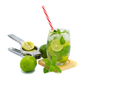 mojito cocktail with lime and mint in glass for hot summer days and good for health isolated white copy spaceの写真素材