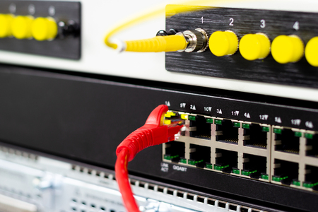 The network cables to connect Lan port in the Datacenter room, concept Communication connection technologyの写真素材