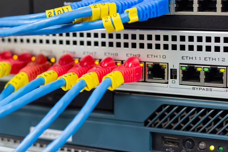 The network cables to connect Lan port in the Datacenter room, concept Communication connection technologyの写真素材