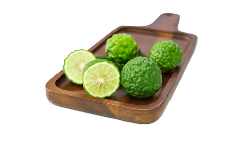 fresh fruits bergamot with cut in half on wood table.の写真素材