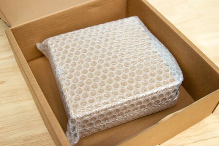 Bubbles covering the box by plastic wrap for protection product cracked  or insurance During transit...