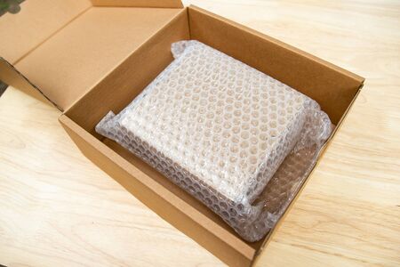 Bubbles covering the box by plastic wrap for protection product cracked  or insurance During transitの写真素材