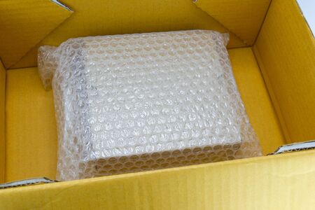 Bubbles covering the box by plastic wrap for protection product cracked  or insurance During transittの写真素材