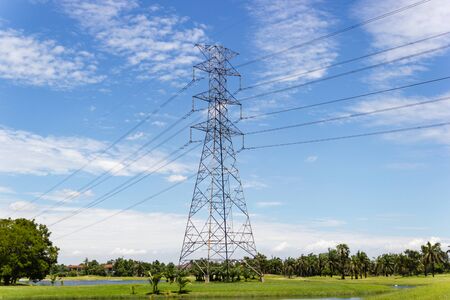 High voltage transmission towers for supplying electricity in the city with blue sky Bangkok Thailandの写真素材