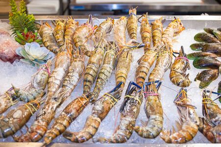 group big fresh shrimp on the ice in supermarket Thai marketの写真素材