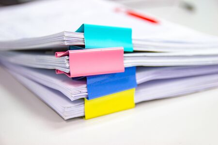 file folder and Stack of business report paper file on the table in a work office, concept document in work officeの写真素材