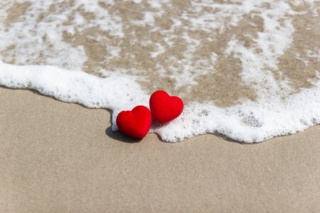 Red heart on a sandy beach. concept Valentine day conceptの写真素材