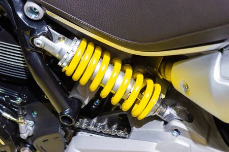 yellow Shock Absorbers of Motorcycle for absorbing joltsの写真素材