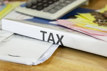 Folder Tax documents and paper files concept Annual tax paymentの写真素材