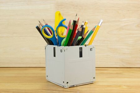 recycle floppy disk, Creative objects used for Store supplies such as pen pencils Scissors in a box...