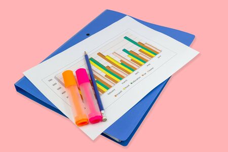 pencil, Blue file, graph sheet, Color highlight pen on pink background isolated, concept Office equipmentの写真素材