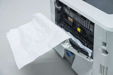 Paper A4 Stuck In Printer At Office, concept repair printerの写真素材