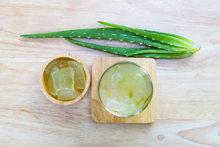 top view image Aloe Vera for drinking on wood table top viewの写真素材