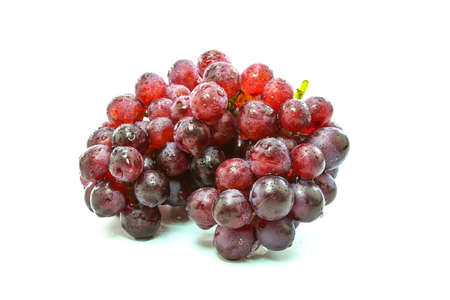 fresh grapes on Wooden tray with isolated white background