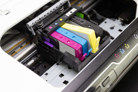 An ink cartridge or inkjet cartridge is a component of an inkjet printer that contains the ink four colorの写真素材