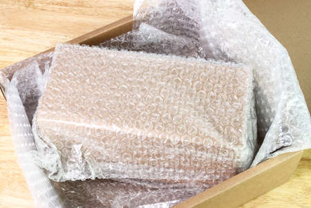 Bubbles covering the box by wrap for protection product cracked  or insurance During transitの写真素材