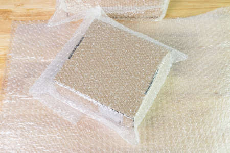 Bubbles covering the box by wrap for protection product cracked  or insurance During transitの写真素材