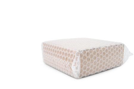 Bubbles covering the box by air wrap for protection product cracked isolated white background copy spaceの写真素材