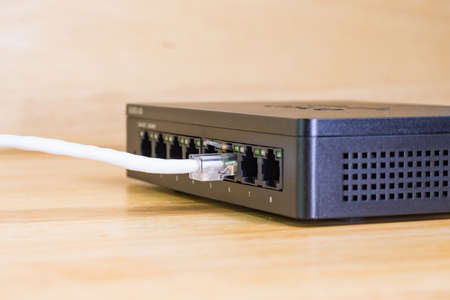 white cables to connect Lan port concept Communication connection technologyの写真素材