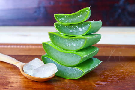 Green fresh Aloe vera sliced fresh aloe on wood tableの写真素材