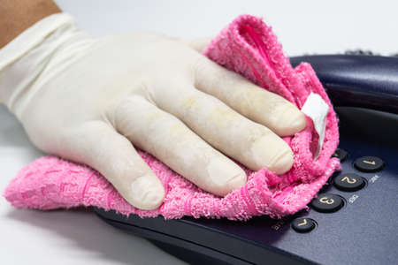 Concept Prevention cleaning frequently, Focus on the high traffic areas that enable pathogens to spread around the telephone equipment such Phone buttonの写真素材