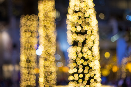 Blurred string led lights on tree in the garden at night time used for decorating for beauty According to important festivalsの写真素材