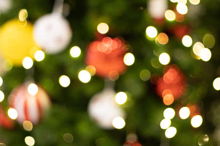 blurred Christmas decorative on the tree for the festivalの写真素材