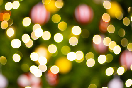 blurred Christmas decorative on the tree for the festivalの写真素材