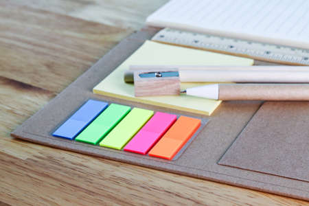 selective focus multicolored square colorful sticky notes on book note concept equipment office and schoolの写真素材