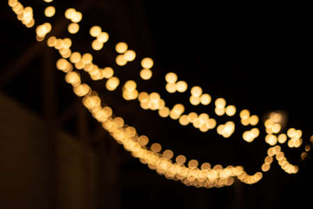 blurred abstract bokeh background for Decorations for New Year and Holidays, Christmas ball lightの写真素材