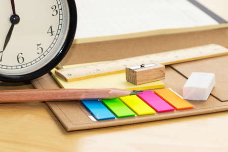 pencil on notebook concept education school equipment on wood tableの写真素材