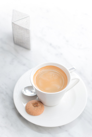 coffee on white marble tableの写真素材