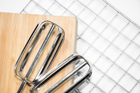 steel grid for grill wood cutting board and Kitchen mixer isolated on white background.の写真素材
