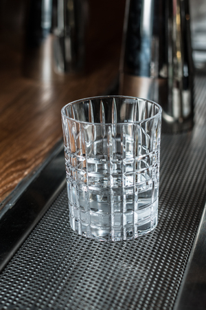 whisky glass on the speedrackの写真素材