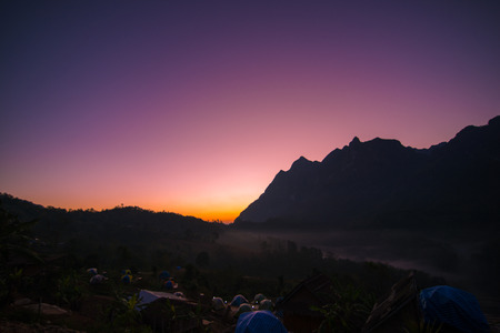 Mountains during sunrise. Beautiful natural landscape in the winter time in Thailandの写真素材