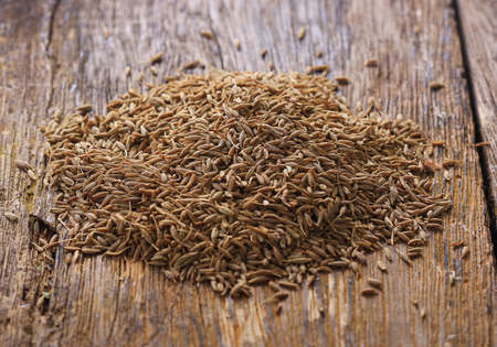 cumin seed, cumin, herb, on wooden oldの写真素材