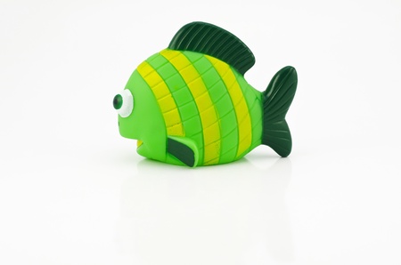  Colorful plastic tropical fish isolated over whiteの写真素材