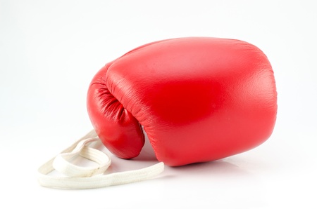 one red boxing glove on a white background, close-upの写真素材