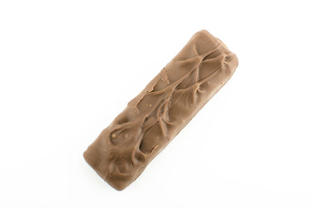 Closeup of chocolate bar isolated on white with clipping pathの写真素材