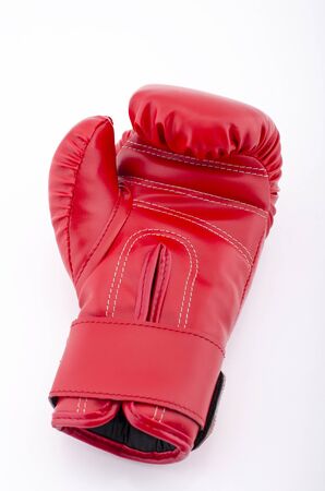 red boxing-gloves on the white backgroundの写真素材