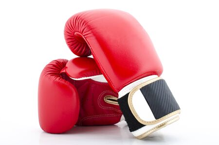 A pair of Red Boxing Gloves on a white Backgroundの写真素材