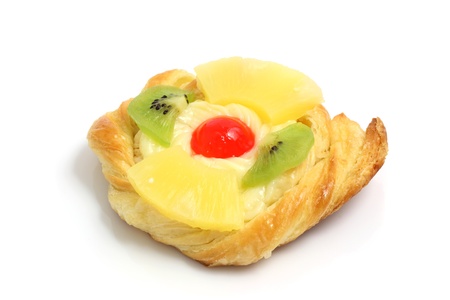 Freshly baked cherry kiwi and pineapple danish pastries fruit tart isolated on white background with copy space. Macro with shallow dof. の写真素材
