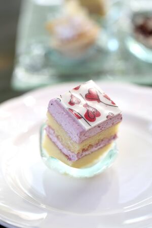 Mini strawberry fruit cake on dish Close-up in shallow DOF の写真素材