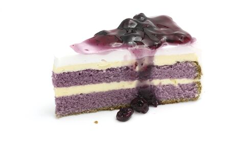 Yummy sweet Crepe mousse cake with blueberry toping isolated in white background の写真素材