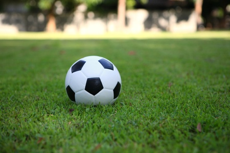 football on grass background