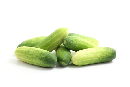 small cucumber isolated in white backgroundの写真素材